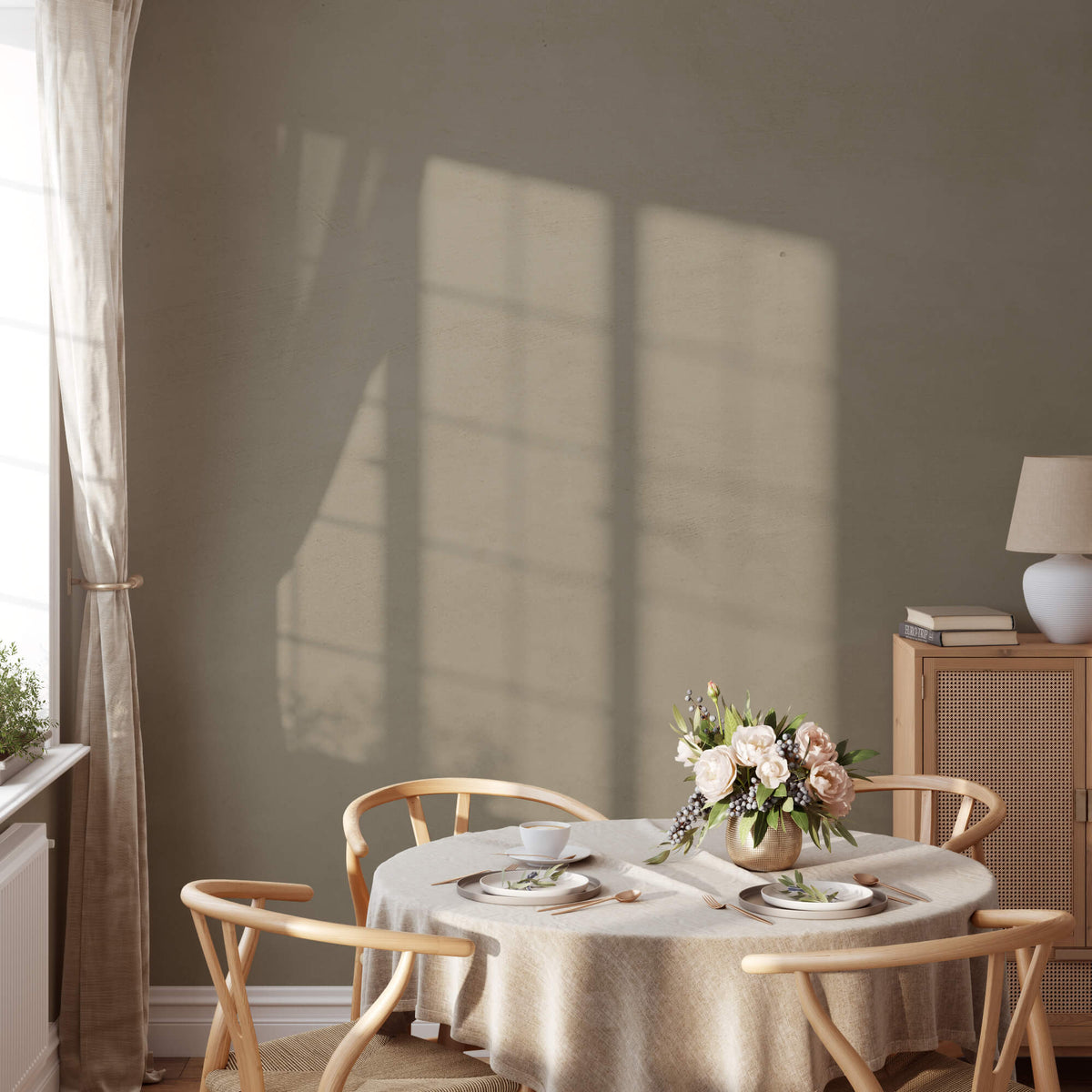 Moody olive green limewash paint in dining area