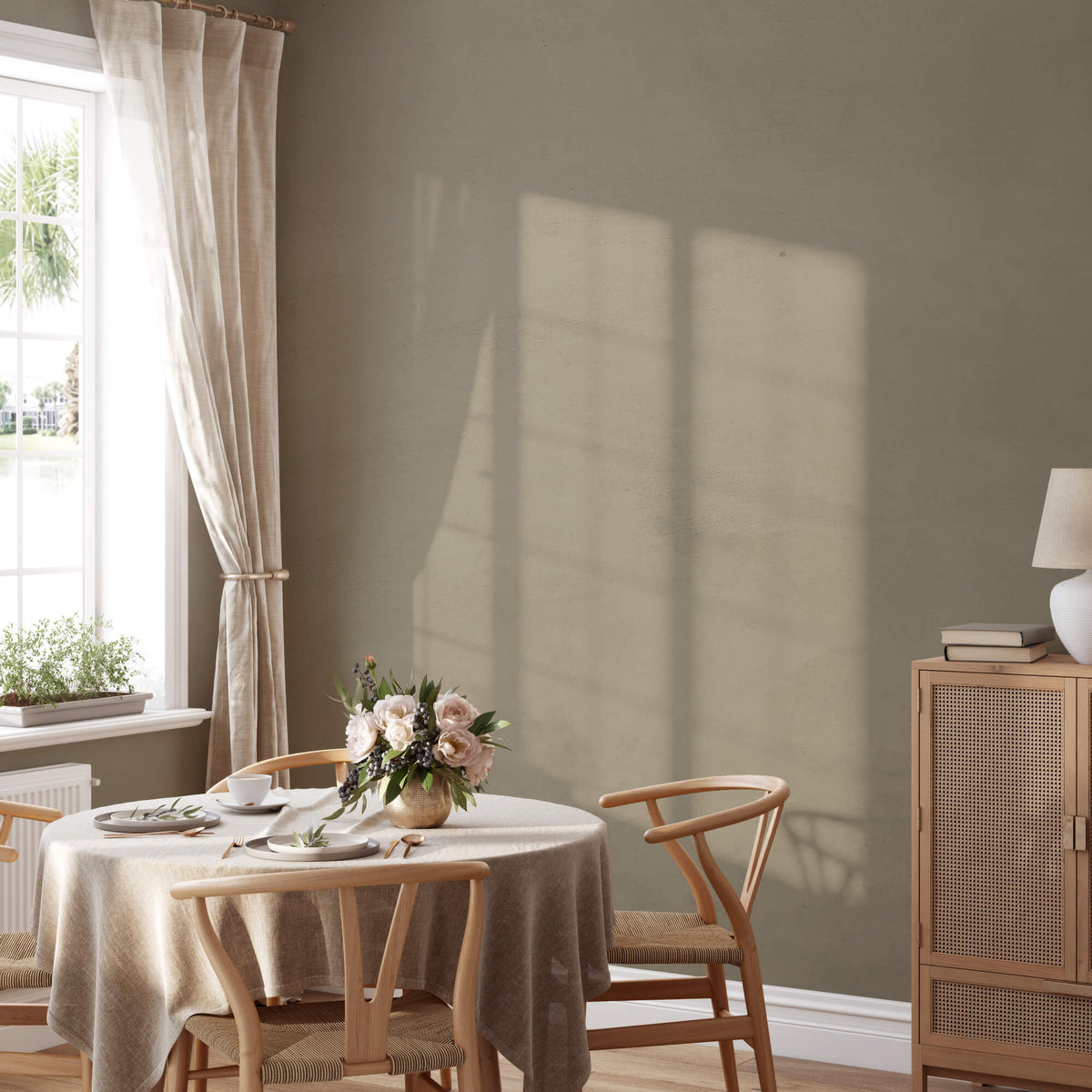 Moody olive brown limewash paint in dining area