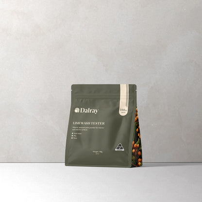 Dalray Australian limewash paint tester packaging on a gray limewash background