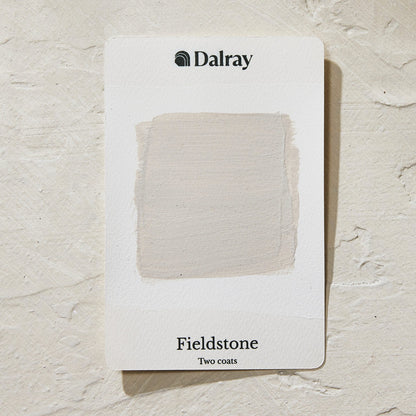 A Dalray paint color card showing the 'Fieldstone' finish with two limewash australia coats applied, displayed on a textured off-white background.