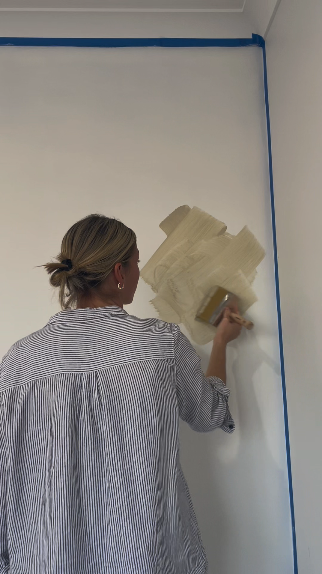 Load video: How to apply Dalray limewash paint with a block brush in criss-cross strokes