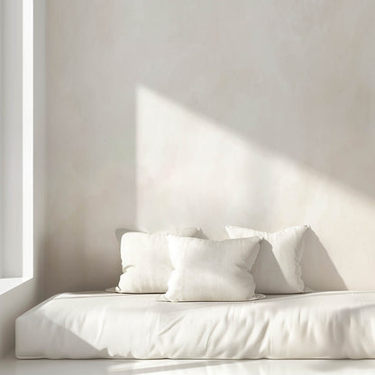 White bed with pillows